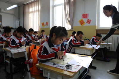 基教研中心中小学教研员走进北京市东直门中学(一六五中学)、雍和宫小学教学调研